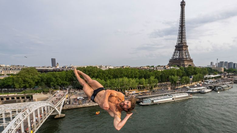 PARIS, FRANCE - JUNE 17: (EDITORIAL USE ONLY) In this handout image provided by Red Bull, David Colturi of the United States dives from the 27.5 metre platform during the first competition day of the second stop of the Red Bull Cliff Diving World Series on June 17, 2023 at Paris, France. (Photo by Romina Amato/Red Bull via Getty Images)